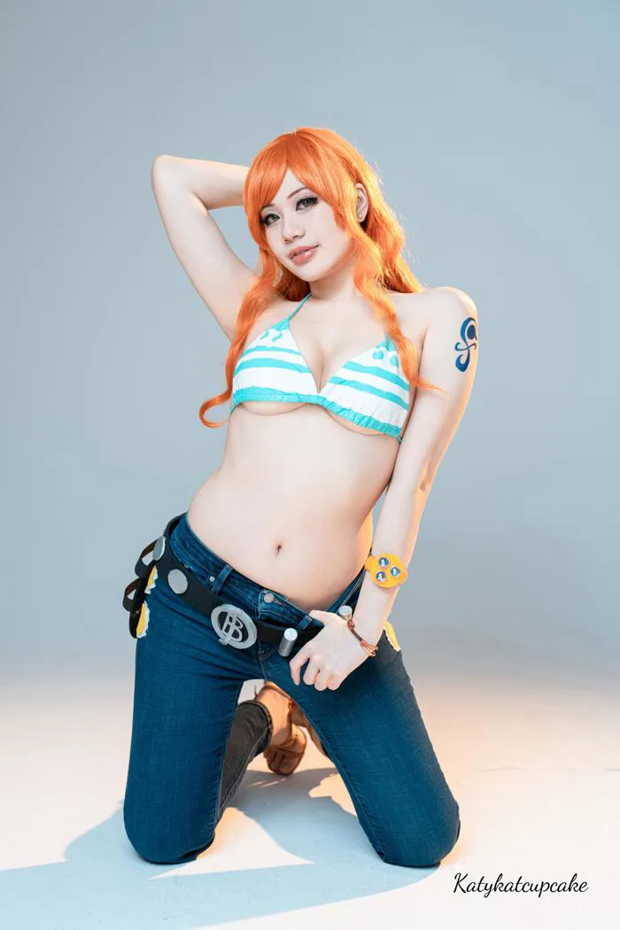 Chia sẻ ảnh cosplay Nami của mình!!! Mình tự làm dây lưng, độ lại bikini và áo khoác nữa XD : r/OnePiece