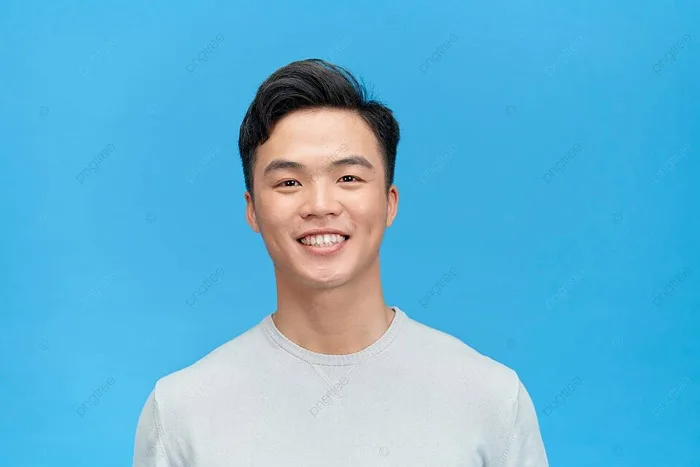 Chàng Trai Trẻ đẹp Trai Nở Nụ Cười Rạng Rỡ Trong Phông Nền Màu Xanh Lam Và Hình  ảnh Để Tải Về Miễn Phí - Pngtree